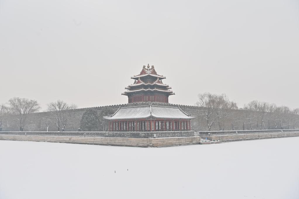 Torreta del Museo del Palacio bajo la nieve en Beijing