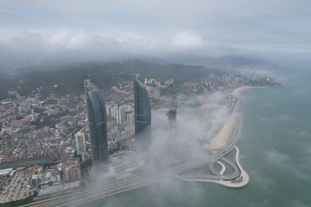 Fujian: Paisaje de niebla de advección en Xiamen