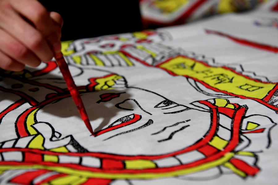 Henan: Pintura de A&ntilde;o Nuevo en bloques de madera en poblado de Zhuxian