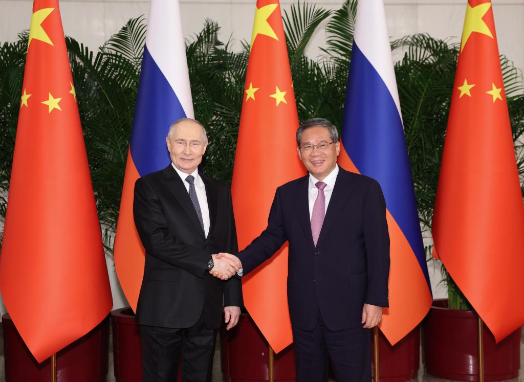 Premier chino se reúne con presidente ruso 3