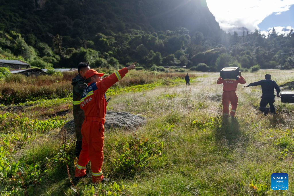 Rescatistas llegan a puerto fronterizo afectado por avalancha de lodo en región suroccidental china de Xizang 13
